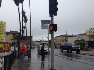 A very damp intersection of 3rd and Normandie.